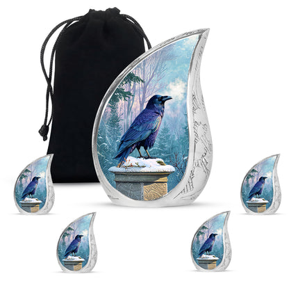Azure Crow Cremation Urn side profile showing urn shape - flowing teardrop crow silhouette on curved aluminum - memorial set with one large and four small urns