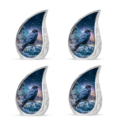 Celestial Blue Crow Cremation Urn close-up of engraving and surface detail - rounded teardrop crow design with delicate detail - 10 inch aluminum urn for cremated remains