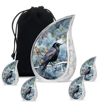 Navy Blue Crow Cremation Urn side profile showing urn shape - flowing teardrop crow silhouette on curved aluminum - memorial set with one large and four small urns