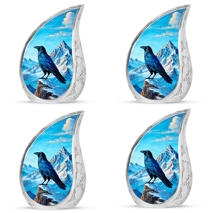 Sapphire Blue Crow Cremation Urn close-up of engraving and surface detail - smooth teardrop contour featuring crow art - 10 inch aluminum urn for cremated remains