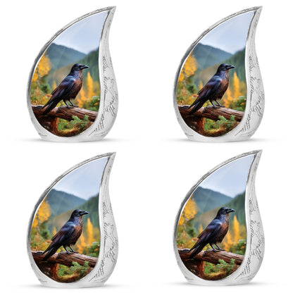 Steel Blue Crow Cremation Urn close-up of engraving and surface detail - smooth teardrop contour featuring crow art - 10 inch aluminum urn for cremated remains