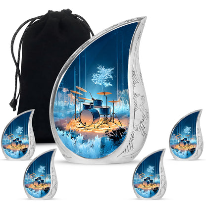 Soft Blue Drums Cremation Urn side profile showing urn shape - graceful tear-shaped urn with drums motif - memorial set with one large and four small urns