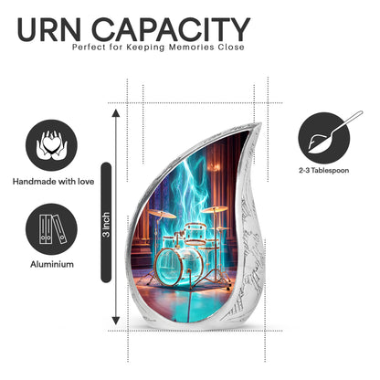 Deep Red Drums Cremation Urn angled view of lid and engraved motif - flowing teardrop drums silhouette on curved aluminum - mini keepsake memorial for portion of cremation ashes