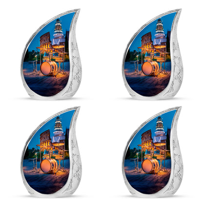 Misty Blue Drums Cremation Urn close-up of engraving and surface detail - flowing teardrop drums silhouette on curved aluminum - 10 inch aluminum urn for cremated remains