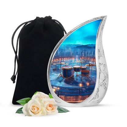 Pastel Blue Drums Cremation Urn front view showing detailed design - flowing teardrop drums silhouette on curved aluminum - full-size 10 inch 200 cubic inch adult cremation urn