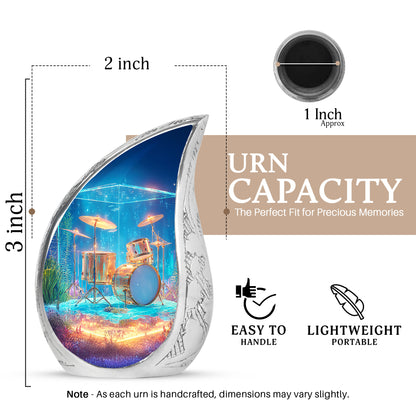 Slate Blue Drums Cremation Urn angled view of lid and engraved motif - flowing teardrop drums silhouette on curved aluminum - mini keepsake memorial for portion of cremation ashes