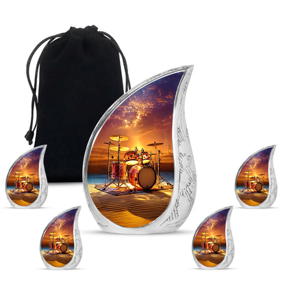 Salmon Pink Drums Cremation Urn side profile showing urn shape - smooth teardrop contour featuring drums art - memorial set with one large and four small urns