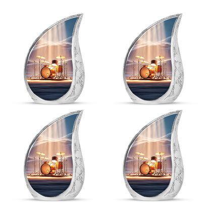 Steel Blue Drums Cremation Urn close-up of engraving and surface detail - smooth teardrop contour featuring drums art - 10 inch aluminum urn for cremated remains