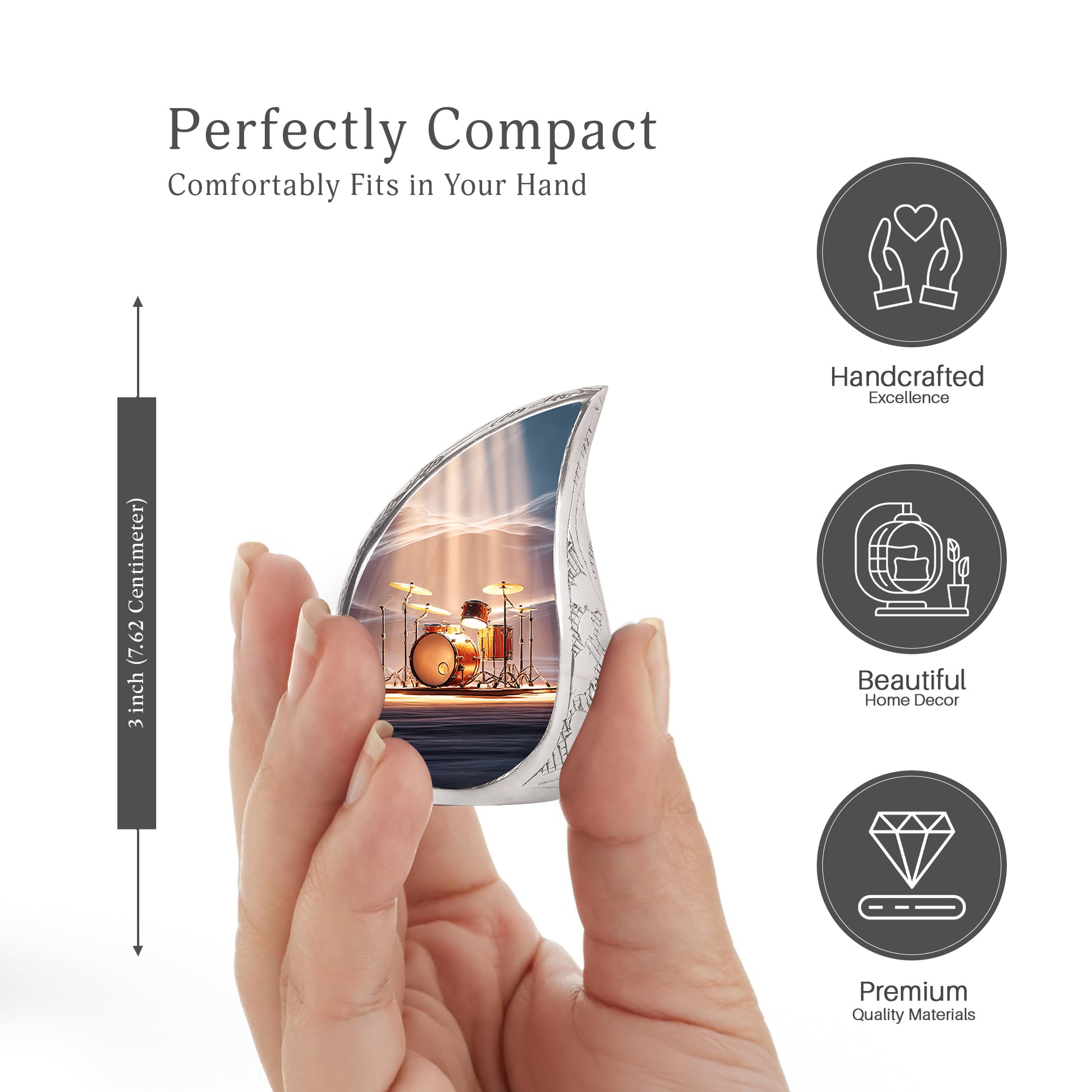 Steel Blue Drums Cremation Urn angled view of lid and engraved motif - smooth teardrop contour featuring drums art - mini keepsake memorial for portion of cremation ashes
