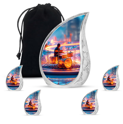 Twilight Blue Drums Cremation Urn side profile showing urn shape - graceful tear-shaped urn with drums motif - memorial set with one large and four small urns