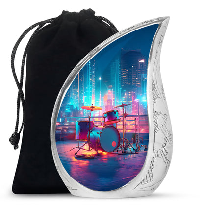 Icy Blue Drums Cremation Urn front view showing detailed design - flowing teardrop drums silhouette on curved aluminum - full-size 10 inch 200 cubic inch adult cremation urn