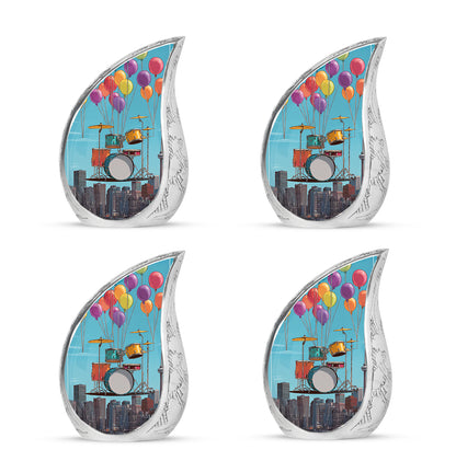 Steel Blue Drums Cremation Urn close-up of engraving and surface detail - smooth teardrop contour featuring drums art - 10 inch aluminum urn for cremated remains