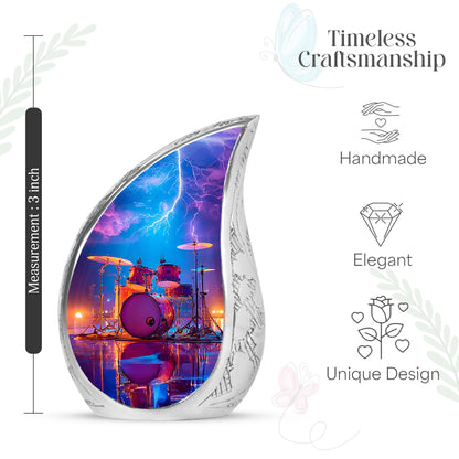 Dusty Blue Drums Cremation Urn angled view of lid and engraved motif - rounded teardrop drums design with delicate detail - mini keepsake memorial for portion of cremation ashes