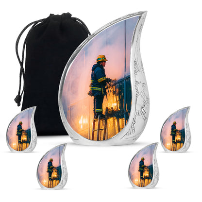 Dusty Blue Firefighter Cremation Urn side profile showing urn shape - flowing teardrop firefighter silhouette on curved aluminum - memorial set with one large and four small urns
