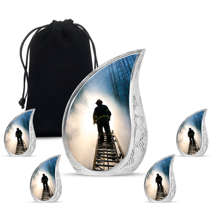 Slate Blue Firefighter Cremation Urn side profile showing urn shape - flowing teardrop firefighter silhouette on curved aluminum - memorial set with one large and four small urns