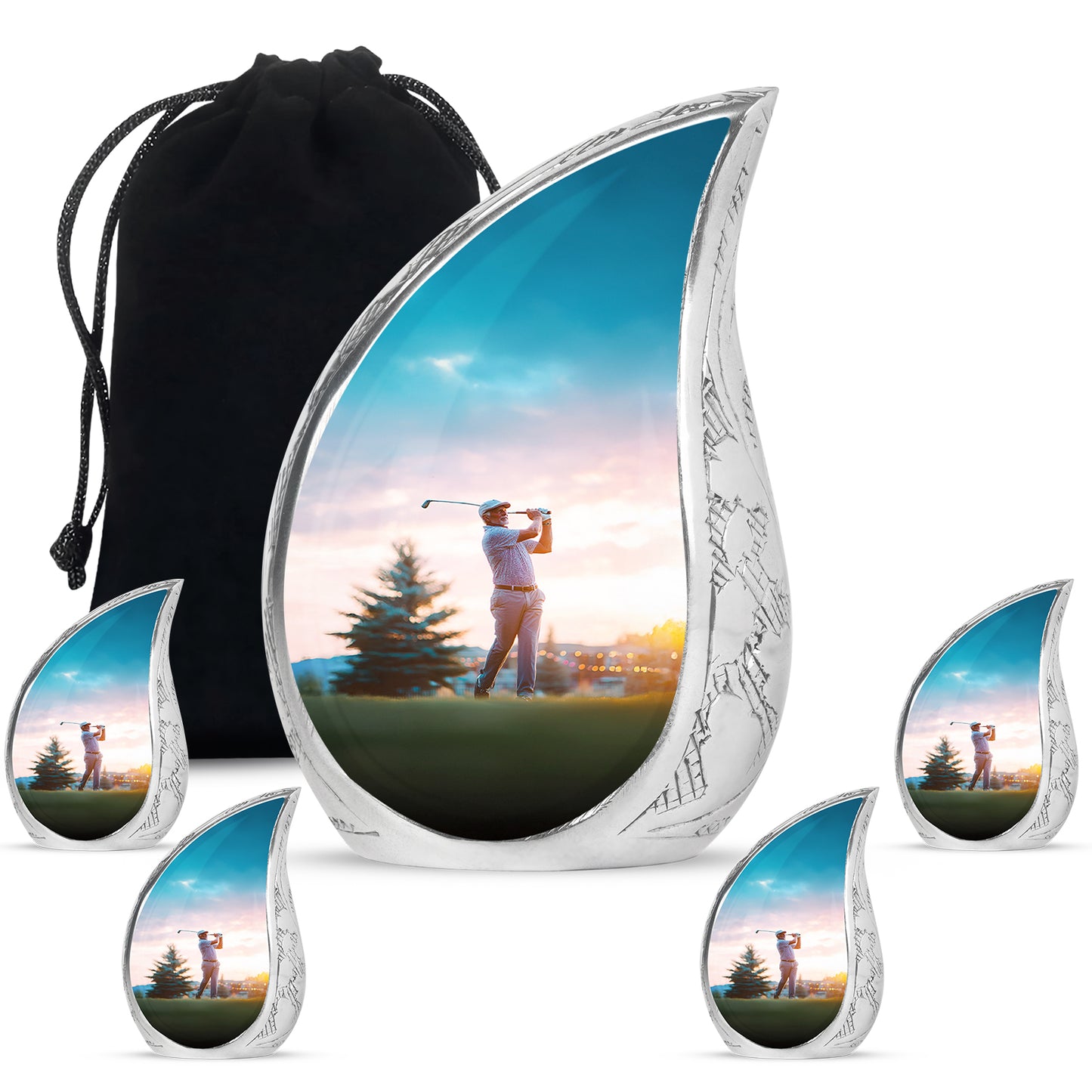 Polished Silver Golf Cremation Urn side profile showing urn shape - smooth teardrop contour featuring golf art - memorial set with one large and four small urns