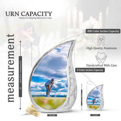 Azure Golf Cremation Urn angled view of lid and engraved motif - rounded teardrop golf design with delicate detail - mini keepsake memorial for portion of cremation ashes