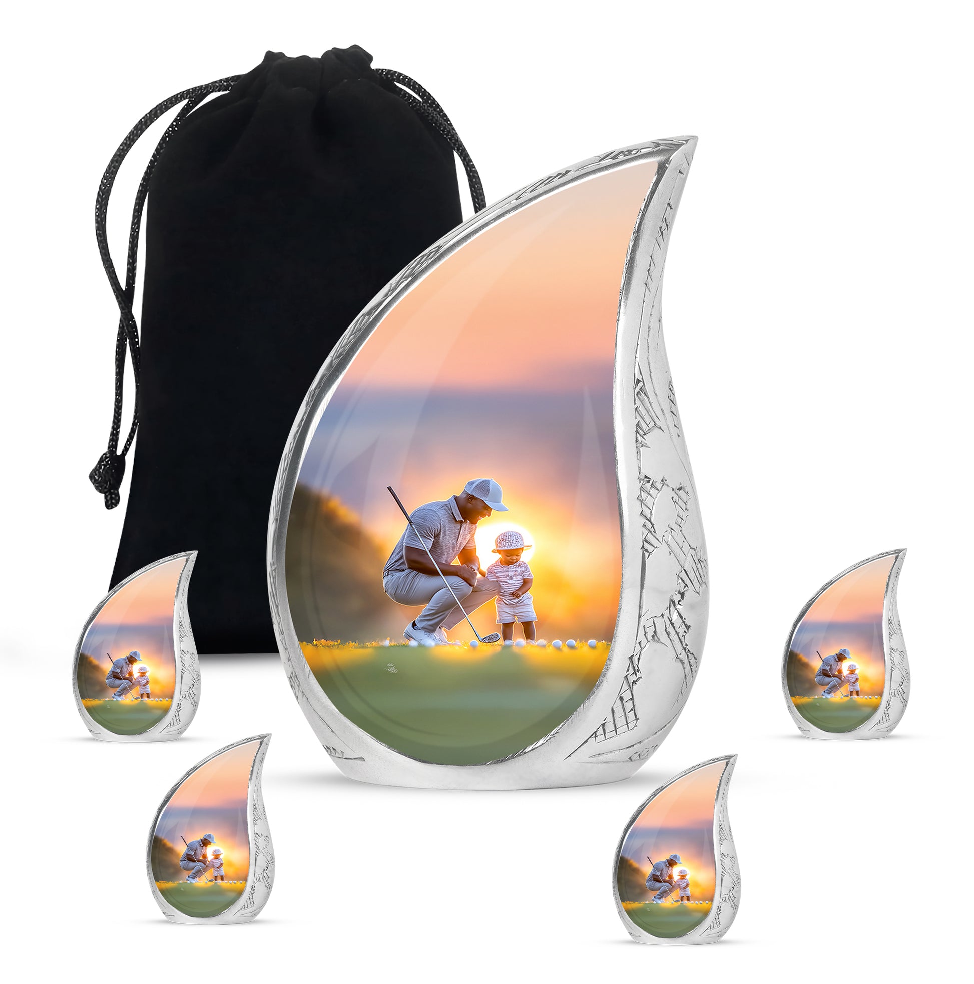 Charcoal Gray Golf Cremation Urn side profile showing urn shape - flowing teardrop golf silhouette on curved aluminum - memorial set with one large and four small urns