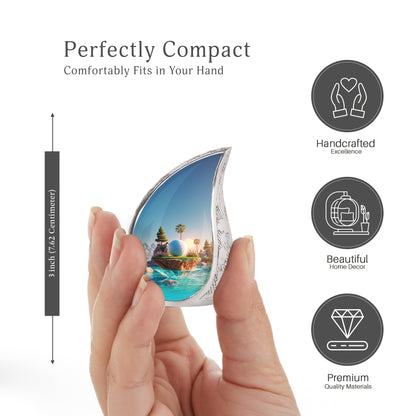 Calming Blue Golf Cremation Urn angled view of lid and engraved motif - smooth teardrop contour featuring golf art - mini keepsake memorial for portion of cremation ashes