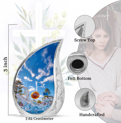 Serene Blue Golf Cremation Urn angled view of lid and engraved motif - smooth teardrop contour featuring golf art - mini keepsake memorial for portion of cremation ashes