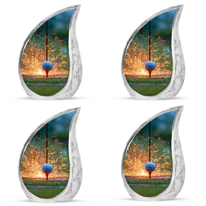 Warm Gold Golf Cremation Urn close-up of engraving and surface detail - smooth teardrop contour featuring golf art - 10 inch aluminum urn for cremated remains