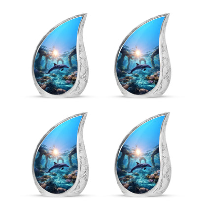 Sapphire Blue Dolphin Cremation Urn close-up of engraving and surface detail - graceful tear-shaped urn with dolphin motif - 10 inch aluminum urn for cremated remains