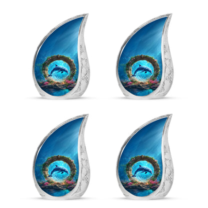 Icy Blue Dolphin Cremation Urn close-up of engraving and surface detail - rounded teardrop dolphin design with delicate detail - 10 inch aluminum urn for cremated remains