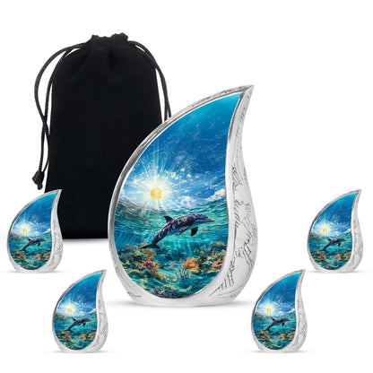 Cornflower Blue Dolphin Cremation Urn side profile showing urn shape - smooth teardrop contour featuring dolphin art - memorial set with one large and four small urns