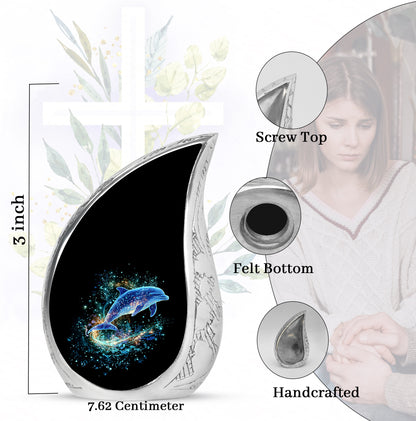 Deep Black Dolphin Cremation Urn angled view of lid and engraved motif - flowing teardrop dolphin silhouette on curved aluminum - mini keepsake memorial for portion of cremation ashes