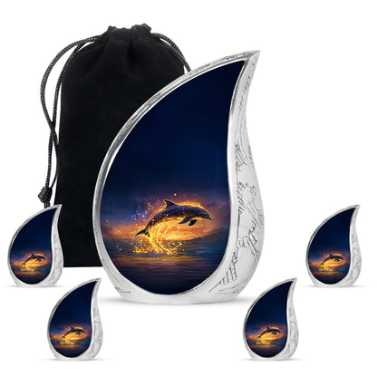 Slate Blue Dolphin Cremation Urn side profile showing urn shape - flowing teardrop dolphin silhouette on curved aluminum - memorial set with one large and four small urns