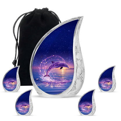 Indigo Dolphin Cremation Urn side profile showing urn shape - rounded teardrop dolphin design with delicate detail - memorial set with one large and four small urns