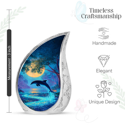 Aqua Teal Dolphin Cremation Urn angled view of lid and engraved motif - smooth teardrop contour featuring dolphin art - mini keepsake memorial for portion of cremation ashes