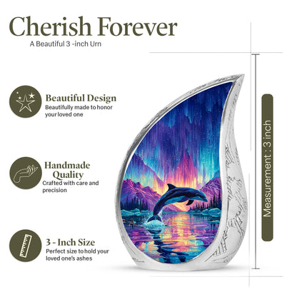 Vivid Blue Dolphin Cremation Urn angled view of lid and engraved motif - graceful tear-shaped urn with dolphin motif - mini keepsake memorial for portion of cremation ashes