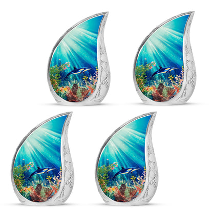 Sea Green Teal Dolphin Cremation Urn close-up of engraving and surface detail - flowing teardrop dolphin silhouette on curved aluminum - 10 inch aluminum urn for cremated remains