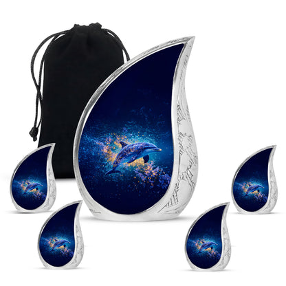 Indigo Dolphin Cremation Urn side profile showing urn shape - rounded teardrop dolphin design with delicate detail - memorial set with one large and four small urns