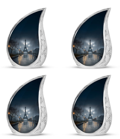 Celestial Blue Eiffel Tower Cremation Urn close-up of engraving and surface detail - flowing teardrop eiffel tower silhouette on curved aluminum - 10 inch aluminum urn for cremated remains