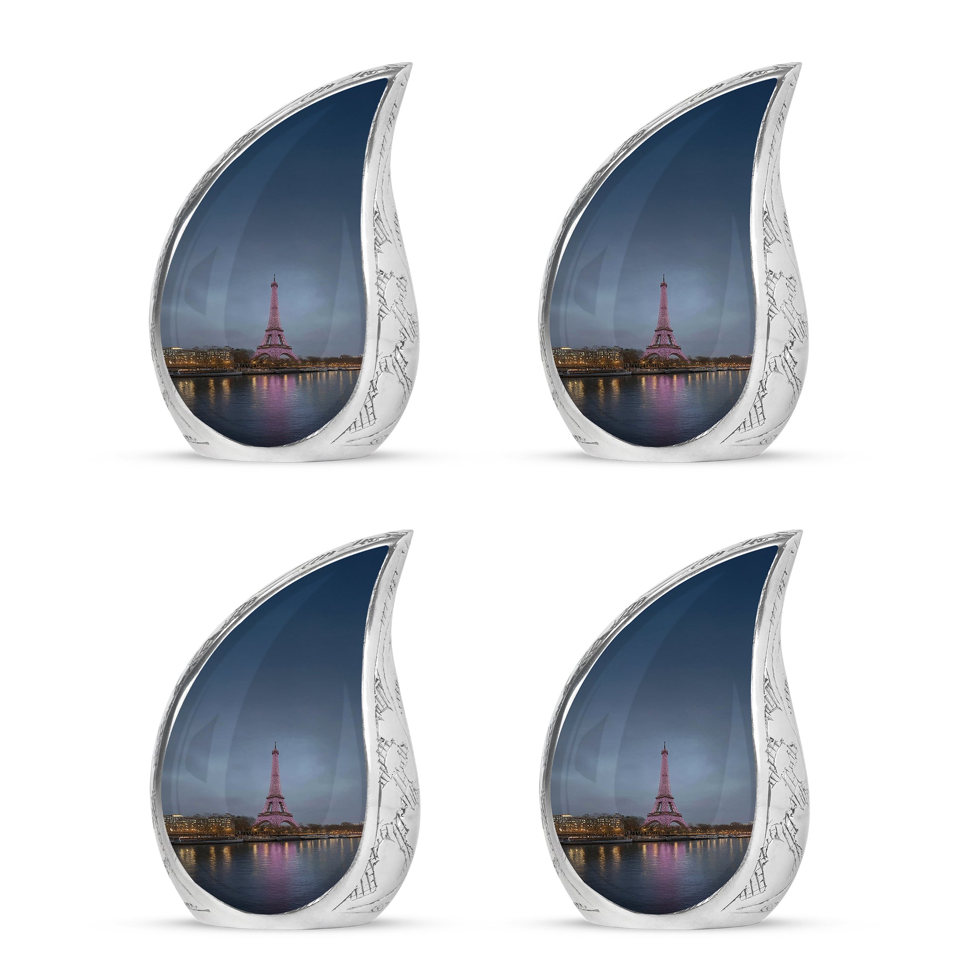 Powder Blue Eiffel Tower Cremation Urn close-up of engraving and surface detail - flowing teardrop eiffel tower silhouette on curved aluminum - 10 inch aluminum urn for cremated remains