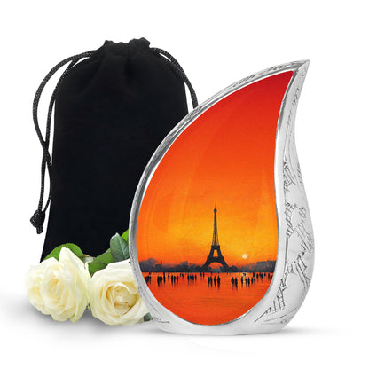 Champagne Gold Eiffel Tower Cremation Urn front view showing detailed design - flowing teardrop eiffel tower silhouette on curved aluminum - full-size 10 inch 200 cubic inch adult cremation urn