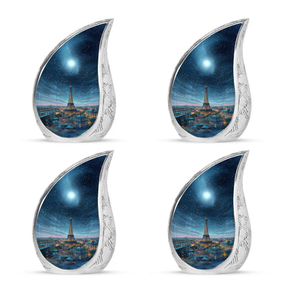 Pastel Blue Eiffel Tower Cremation Urn close-up of engraving and surface detail - rounded teardrop eiffel tower design with delicate detail - 10 inch aluminum urn for cremated remains