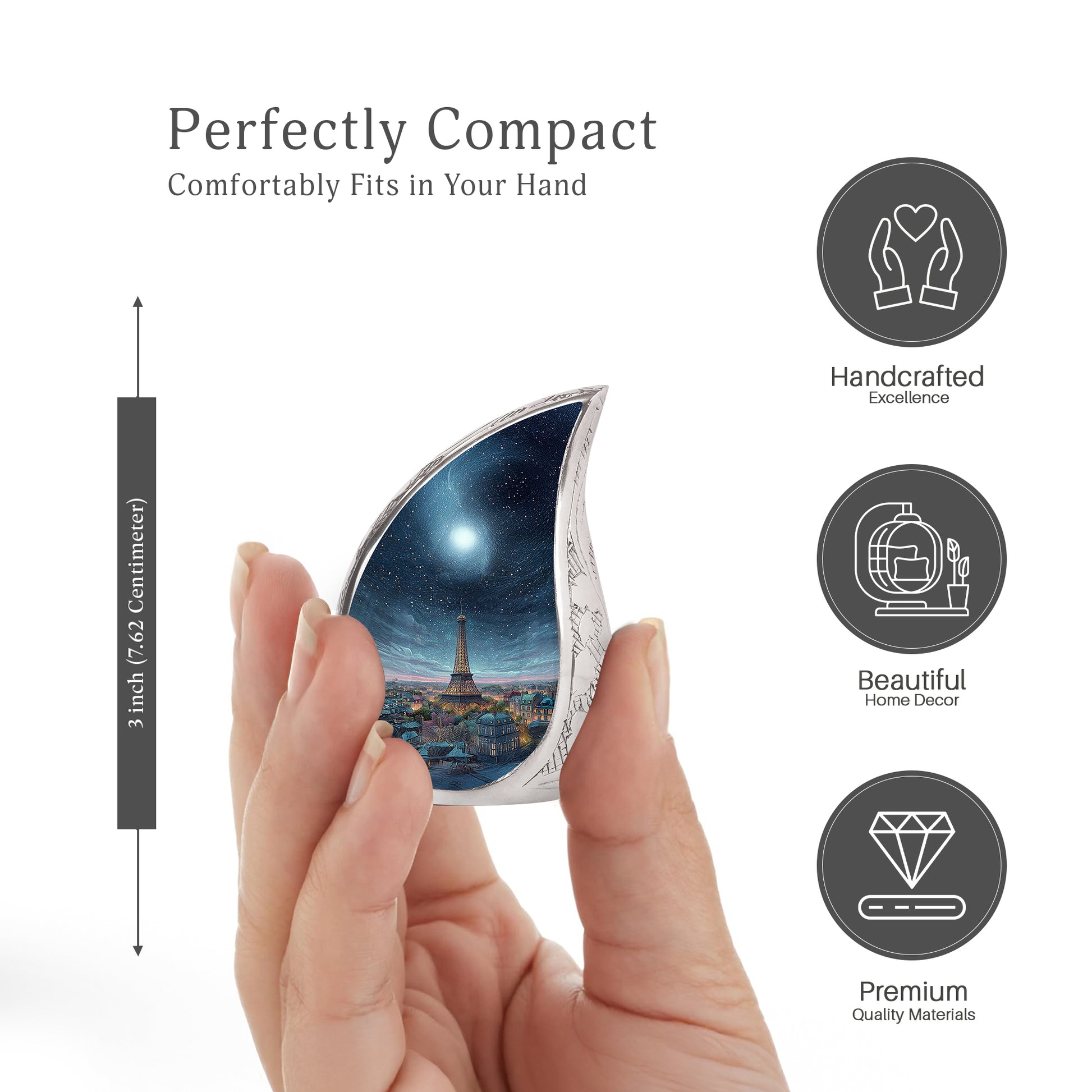 Misty Blue Eiffel Tower Cremation Urn angled view of lid and engraved motif - rounded teardrop eiffel tower design with delicate detail - mini keepsake memorial for portion of cremation ashes
