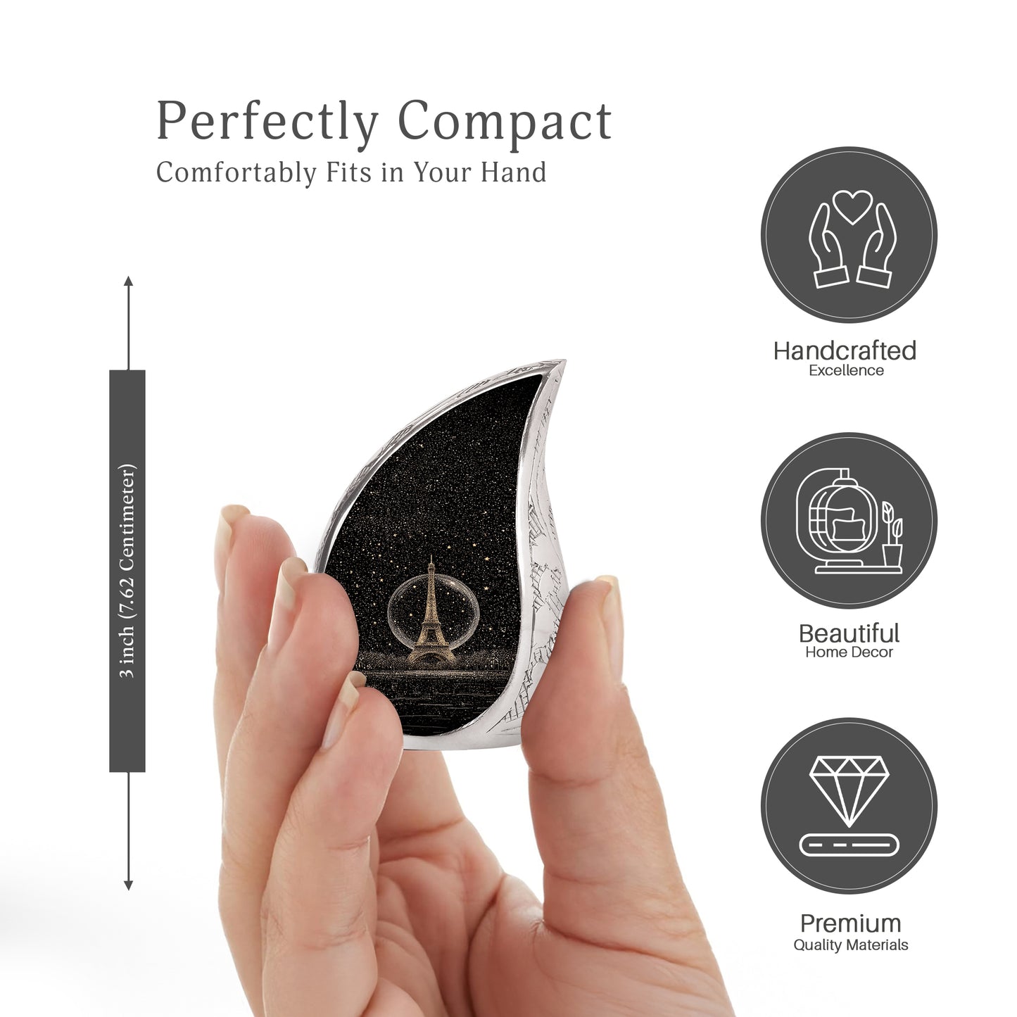 Rich Black Eiffel Tower Cremation Urn angled view of lid and engraved motif - rounded teardrop eiffel tower design with delicate detail - mini keepsake memorial for portion of cremation ashes