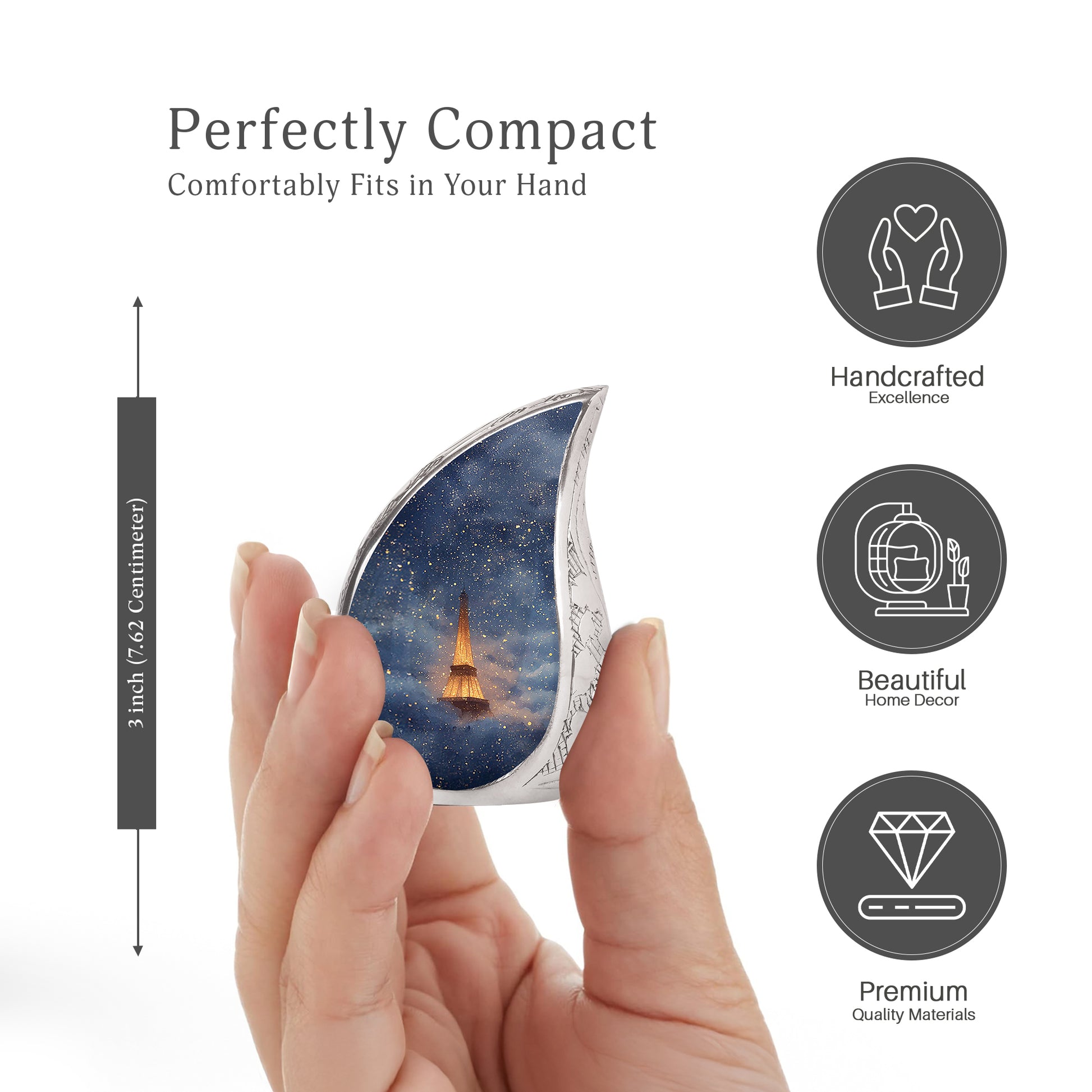 Twilight Blue Eiffel Tower Cremation Urn angled view of lid and engraved motif - smooth teardrop contour featuring eiffel tower art - mini keepsake memorial for portion of cremation ashes
