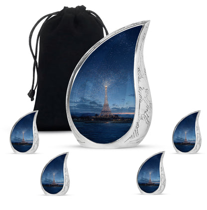 Soft Blue Eiffel Tower Cremation Urn side profile showing urn shape - smooth teardrop contour featuring eiffel tower art - memorial set with one large and four small urns