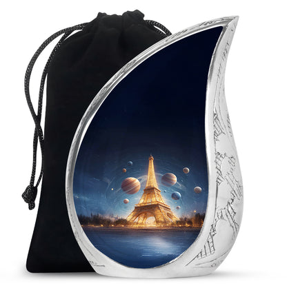 Celestial Blue Eiffel Tower Cremation Urn front view showing detailed design - flowing teardrop eiffel tower silhouette on curved aluminum - full-size 10 inch 200 cubic inch adult cremation urn