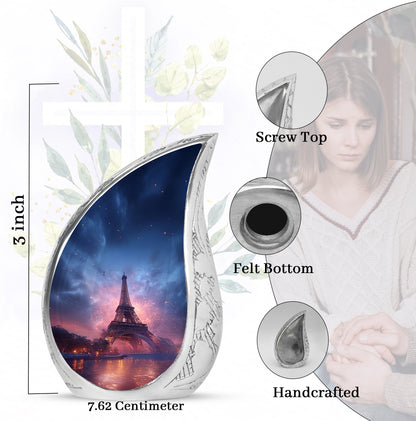 Vivid Blue Eiffel Tower Cremation Urn angled view of lid and engraved motif - graceful tear-shaped urn with eiffel tower motif - mini keepsake memorial for portion of cremation ashes