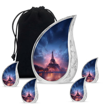 Calming Blue Eiffel Tower Cremation Urn side profile showing urn shape - smooth teardrop contour featuring eiffel tower art - memorial set with one large and four small urns