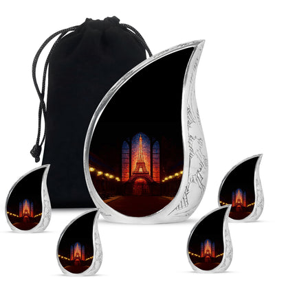 Onyx Black Eiffel Tower Cremation Urn side profile showing urn shape - graceful tear-shaped urn with eiffel tower motif - memorial set with one large and four small urns