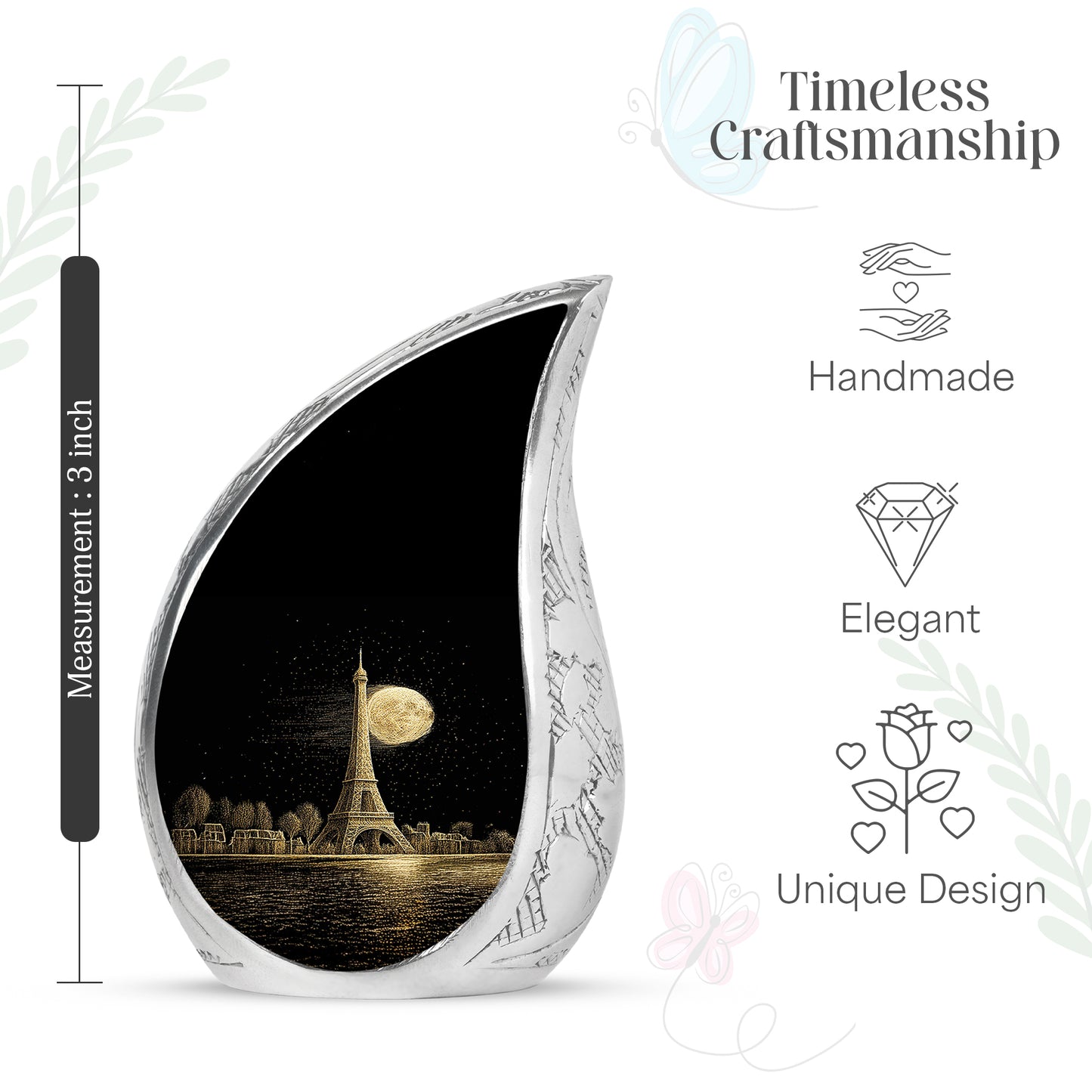 Onyx Black Eiffel Tower Cremation Urn angled view of lid and engraved motif - smooth teardrop contour featuring eiffel tower art - mini keepsake memorial for portion of cremation ashes