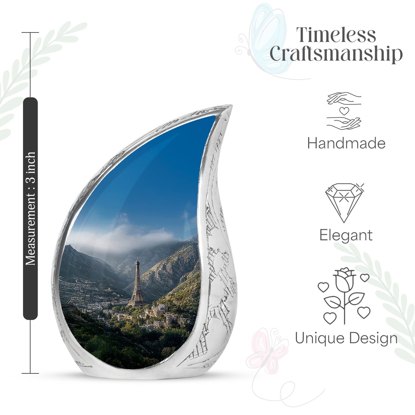 Cornflower Blue Eiffel Tower Cremation Urn angled view of lid and engraved motif - graceful tear-shaped urn with eiffel tower motif - mini keepsake memorial for portion of cremation ashes