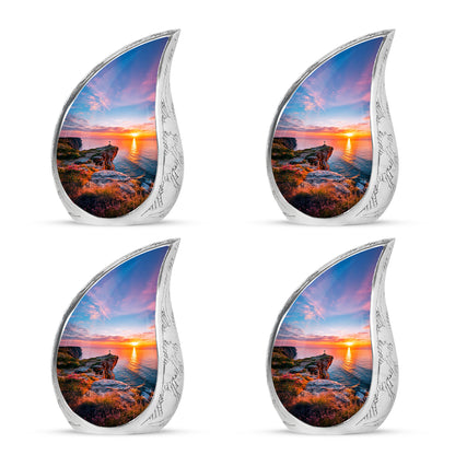 Platinum Silver Cross Cremation Urn close-up of engraving and surface detail - flowing teardrop cross silhouette on curved aluminum - 10 inch aluminum urn for cremated remains